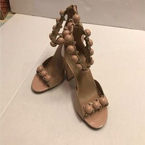 Ladies Charlotte Russe heels approx size 8. Patten pinkish-tan color